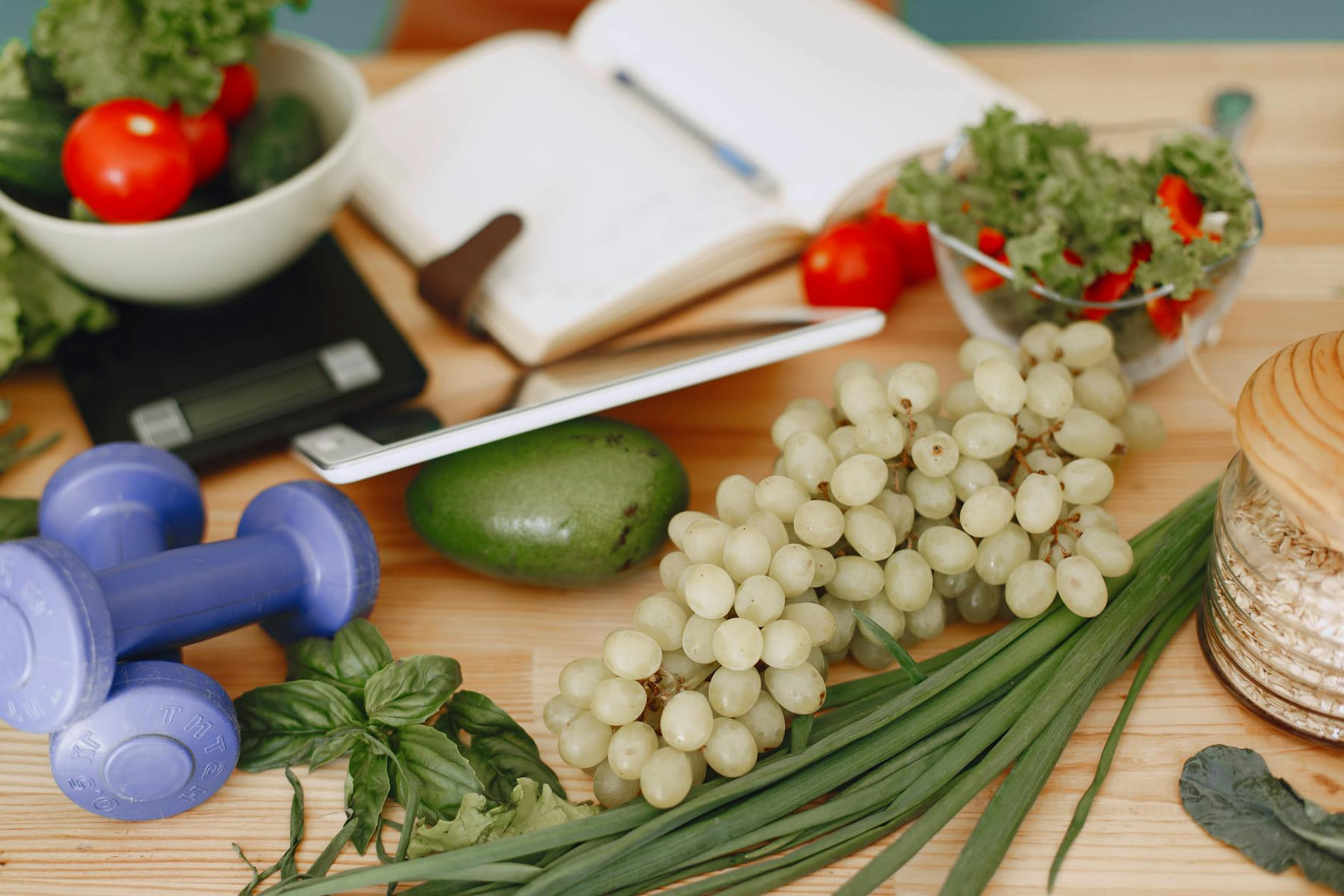 A vibrant composition of fruits, vegetables, and fitness items promoting a healthy lifestyle. on Think Lean Live Strong